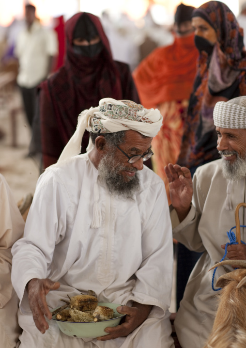 Man Joking With The Honey Seller In Sinaw Market, Oman