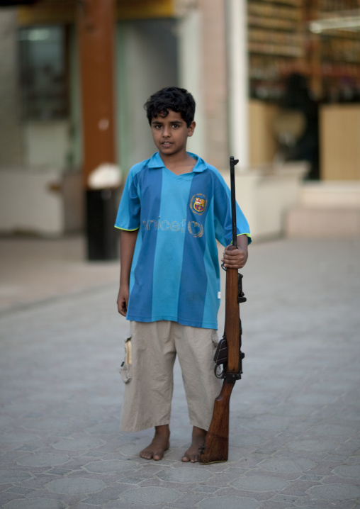 Boty Holding A Shotgun, Salalah, Oman