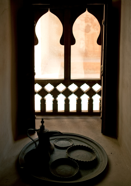 A Set Of Coffe Ustensil Inside The Arabic  Window In A Traditional House, Sur, Oman