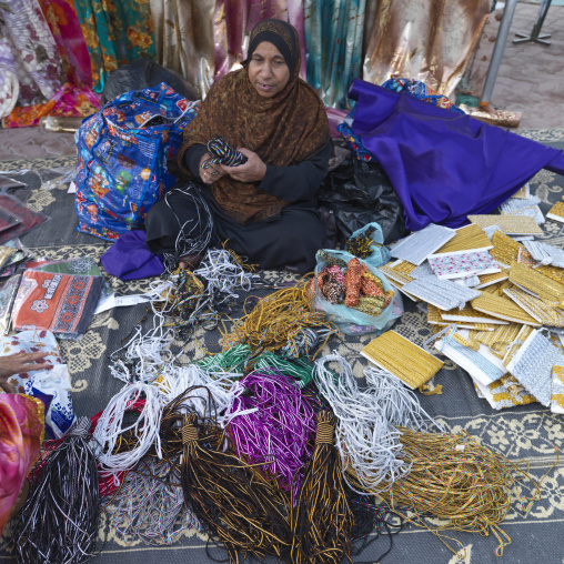 An Old Vendor Is Selling Trinkets In Ibra Souq Oman, Oman
