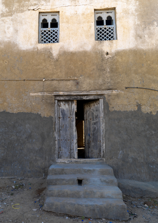 Old House In Arabic Style With Wooden Windows And Door, Mirbat, Oman