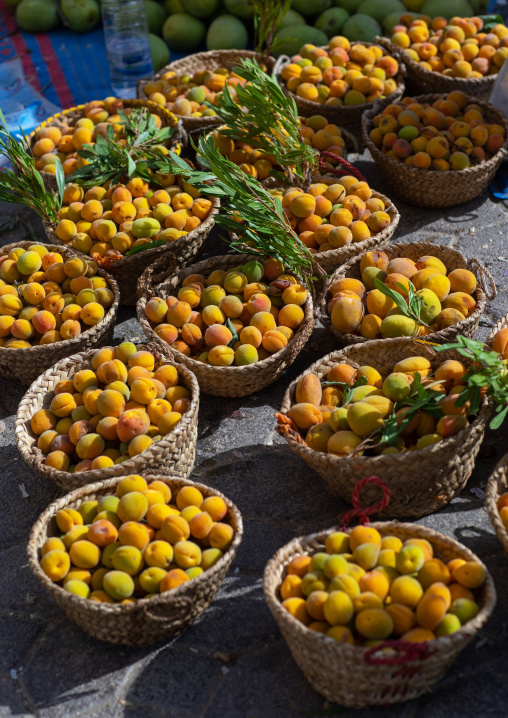Apricots in baskets on market, Ad Dakhiliyah Region, Nizwa, Oman