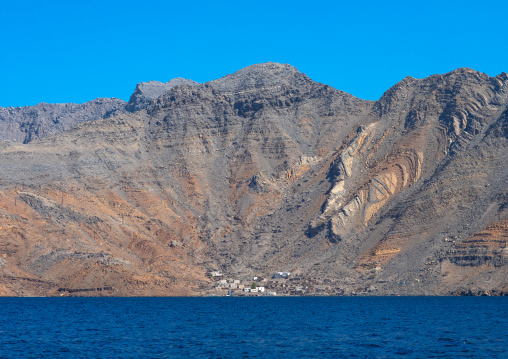 Small village at the bottom of the mountain, Musandam Governorate, Khasab, Oman