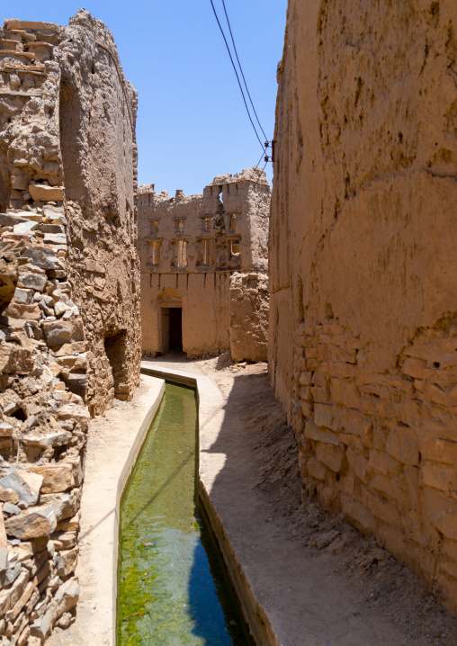 Falaj transporting water thru an old village, Ad Dakhiliyah ‍Governorate, Birkat Al Mouz, Oman