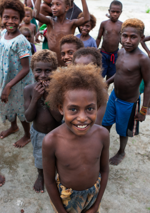 Portrait of children with blonde hair, New Ireland Province, Langania, Papua New Guinea