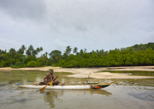 Man on a camoe on the sea, New Ireland Province, Kavieng, Papua New Guinea