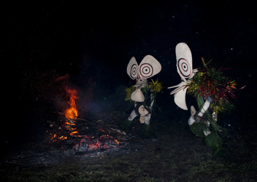 Dancer with a giant mask during a Baining tribe fire dance, East New Britain Province, Rabaul, Papua New Guinea