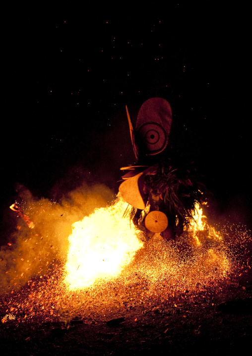 Dancer with a giant mask during a Baining tribe fire ceremony, East New Britain Province, Rabaul, Papua New Guinea