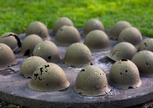 Army helmets from World War II era, East New Britain Province, Rabaul, Papua New Guinea
