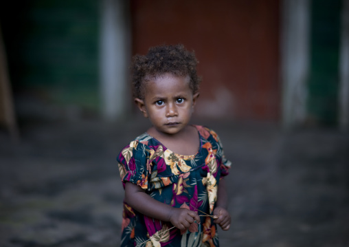 Portrait of a little girl in the street, East New Britain Province, Rabaul, Papua New Guinea