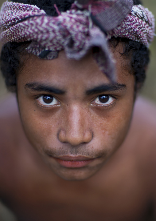 Portrait of a boy with a headbang, Milne Bay Province, Alotau, Papua New Guinea