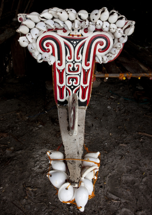 Traditional canoe boe with carved and painted decorations, Milne Bay Province, Trobriand Island, Papua New Guinea