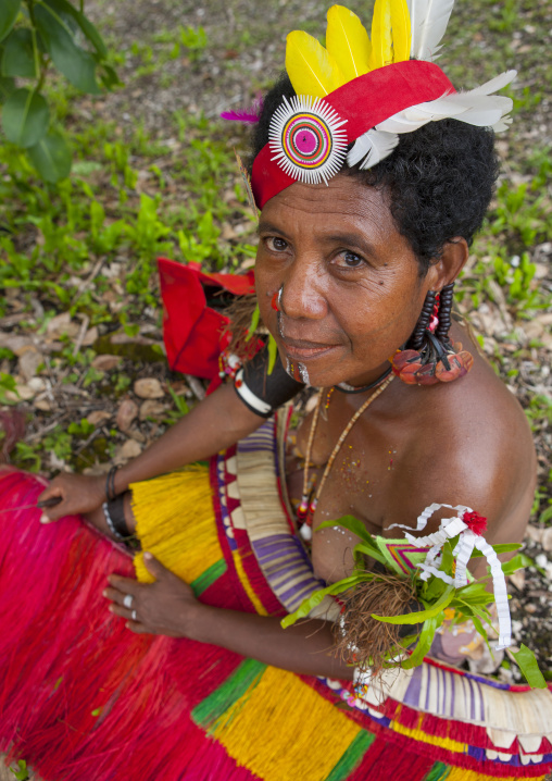 Tribal woman before for a ceremony, Milne Bay Province, Trobriand Island, Papua New Guinea