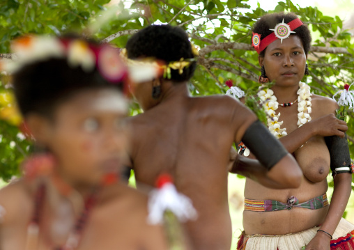 Tribal women ready for a ceremony, Milne Bay Province, Trobriand Island, Papua New Guinea