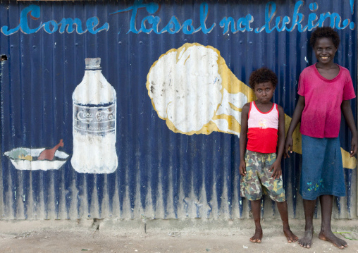 Girls in front of a restaurant, Autonomous Region of Bougainville, Bougainville, Papua New Guinea