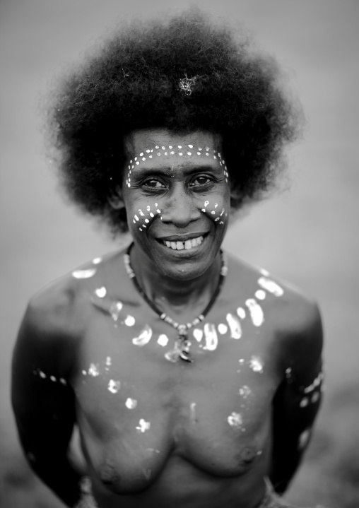 Portrait of a smiling topless woman with a traditional makeup, Autonomous Region of Bougainville, Bougainville, Papua New Guinea