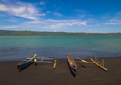 Traditional canoe on a beach, East New Britain Province, Rabaul, Papua New Guinea
