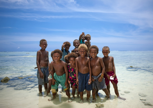 Group of children at the beach, New Ireland Province, Langania, Papua New Guinea