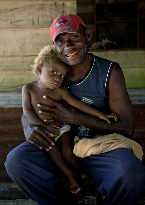Father and his blonde son, New Ireland Province, Laraibina, Papua New Guinea