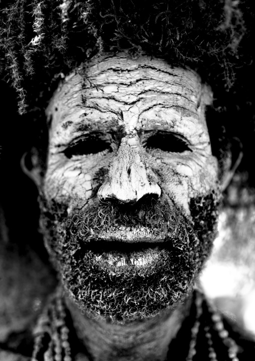 Chimbu tribe man with the face covered in mud, Western Highlands Province, Mount Hagen, Papua New Guinea