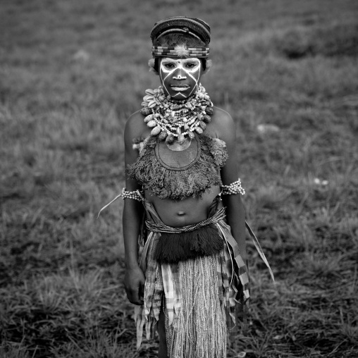 Highlander child during sing-sing ceremony, Western Highlands Province, Mount Hagen, Papua New Guinea
