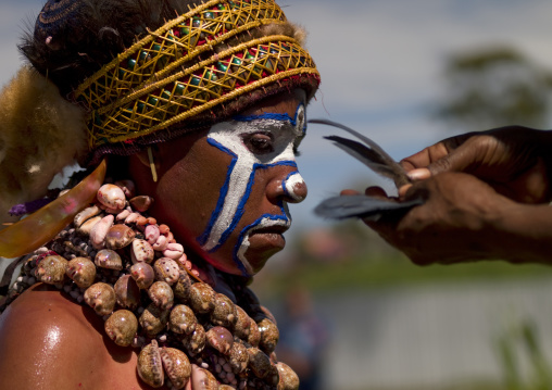Portrait of a Highlander woman makeup during a sing-sing, Western Highlands Province, Mount Hagen, Papua New Guinea