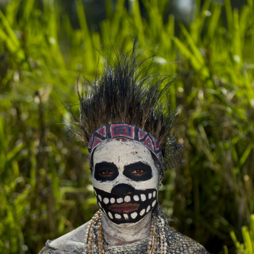 Skeleton tribe woman during a sing sing, Western Highlands Province, Mount Hagen, Papua New Guinea