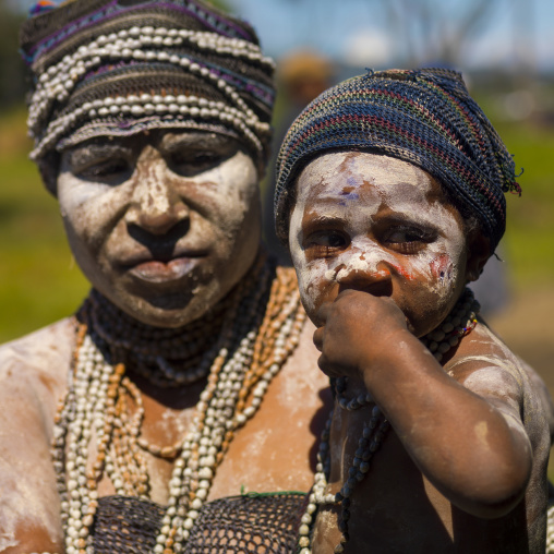 Mourning mother with her boy, Western Highlands Province, Mount Hagen, Papua New Guinea