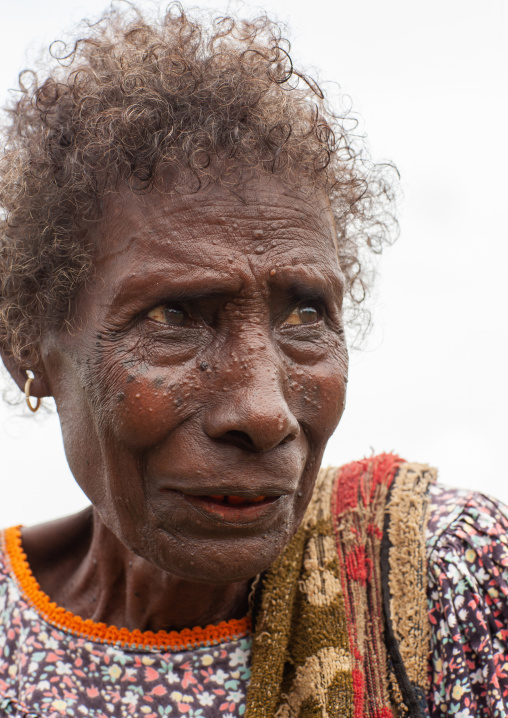Portrait of a senior woman looking away, Autonomous Region of Bougainville, Bougainville, Papua New Guinea