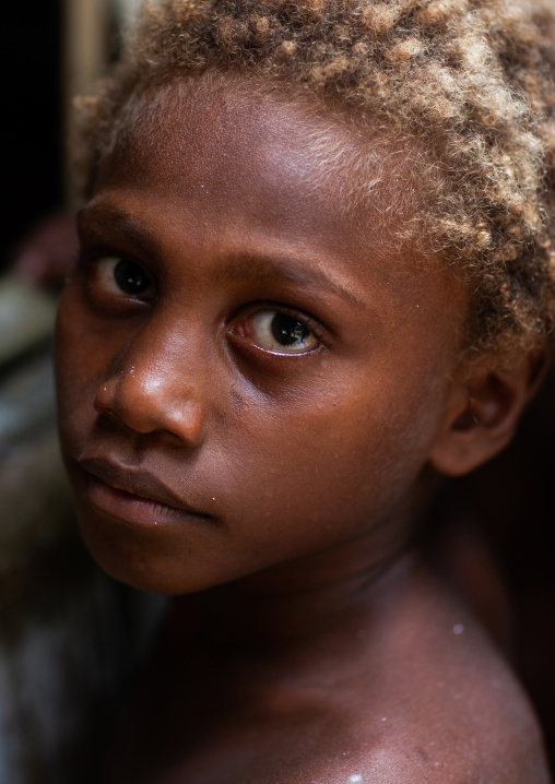 Portrait of a boy with blonde hair, New Ireland Province, Kapleman, Papua New Guinea