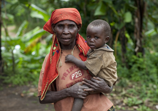 Batwa tribe mother holding her child, Western Province, Cyamudongo, Rwanda