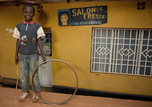 Rwandan boy playing n the street, Kigali Province, Kigali, Rwanda