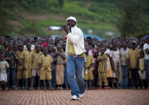 Rwandan hip hop singer performing in a village, Kigali Province, Nyirangarama, Rwanda