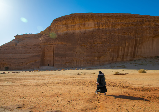 Saudi woman in niqab in the desert of Madain Saleh, Al Madinah Province, Alula, Saudi Arabia
