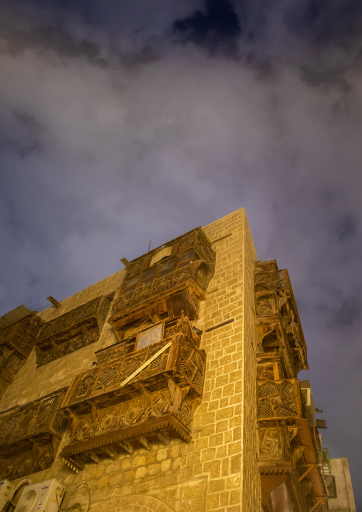 Historic house with wooden mashrabiyas in al-Balad quarter at night, Mecca province, Jeddah, Saudi Arabia