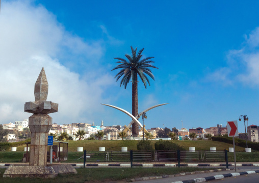Giant swords and palm on a roundabout, Al-Bahah region, Al-Bahah, Saudi Arabia