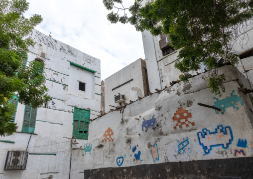 Space invaders art on the wall of a house, Mecca province, Jeddah, Saudi Arabia