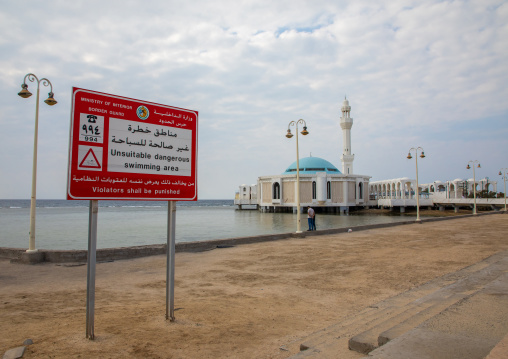 No swimming billboard in front of the floating mosque or Masjid bibi Fatima, Mecca province, Jeddah, Saudi Arabia