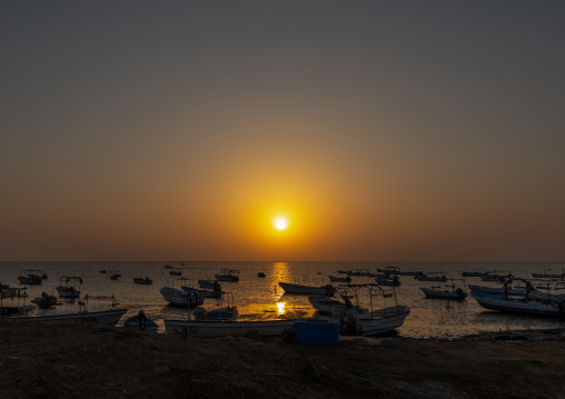 Sunset on a port full of boats, Jizan Province, Sabya, Saudi Arabia
