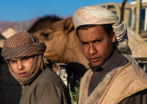 Saudi young men in the camel market, Najran Province, Najran, Saudi Arabia