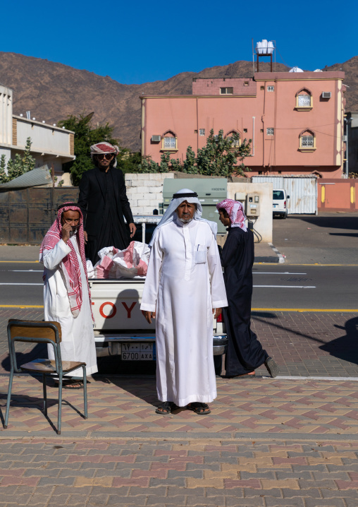 Saudi men loading furnitures in their toyota car, Najran Province, Najran, Saudi Arabia