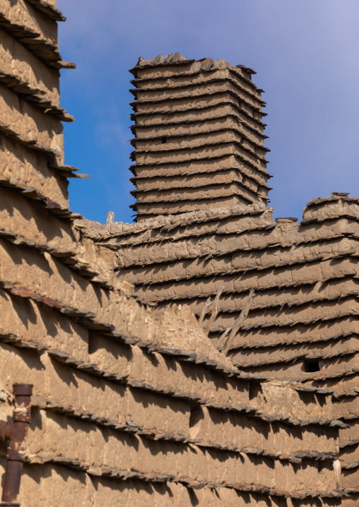 Stone and mud houses and watchtower with slates in al Khalaf village, Asir province, Sarat Abidah, Saudi Arabia