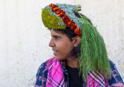 Portrait of a flower man wearing a floral crown on the head, Jizan Province, Addayer, Saudi Arabia