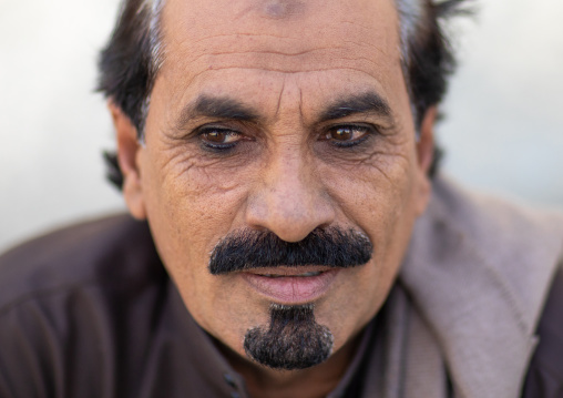 Portrait of a saudi man with kohl on his eyes, Jizan Province, Addayer, Saudi Arabia