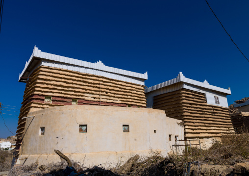 Traditional clay and silt home with a modern roof in a village, Asir Province, Ahad Rafidah, Saudi Arabia