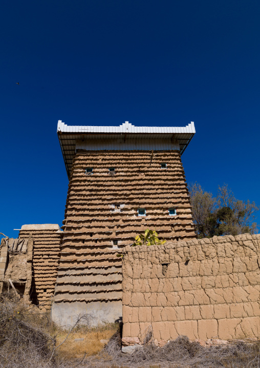 Traditional clay and silt home with a modern roof in a village, Asir Province, Ahad Rafidah, Saudi Arabia
