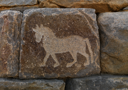 Horse carved on a rockj in Al Ukhdud Archeological site, Najran Province, Najran, Saudi Arabia