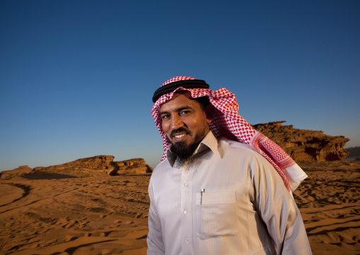Portrait of a saudi man in the desert, Al Madinah Province, Alula, Saudi Arabia