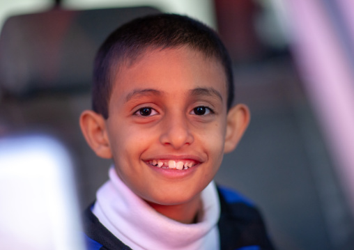 Portrait of a smiling saudi boy, Al-Sarawat, Fifa Mountains, Saudi Arabia