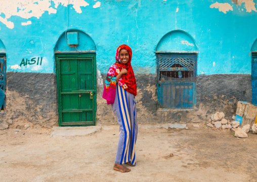 Portrait of a somali young woman in the streets of the old town, Sahil region, Berbera, Somaliland